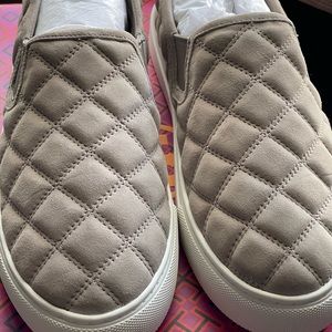 Tory Burch Slip Ons. Brand new. Still in box.